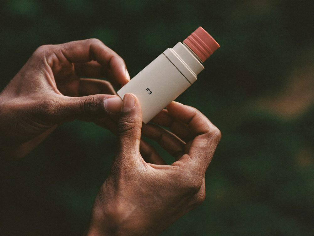 Hands holding a small modern medical device